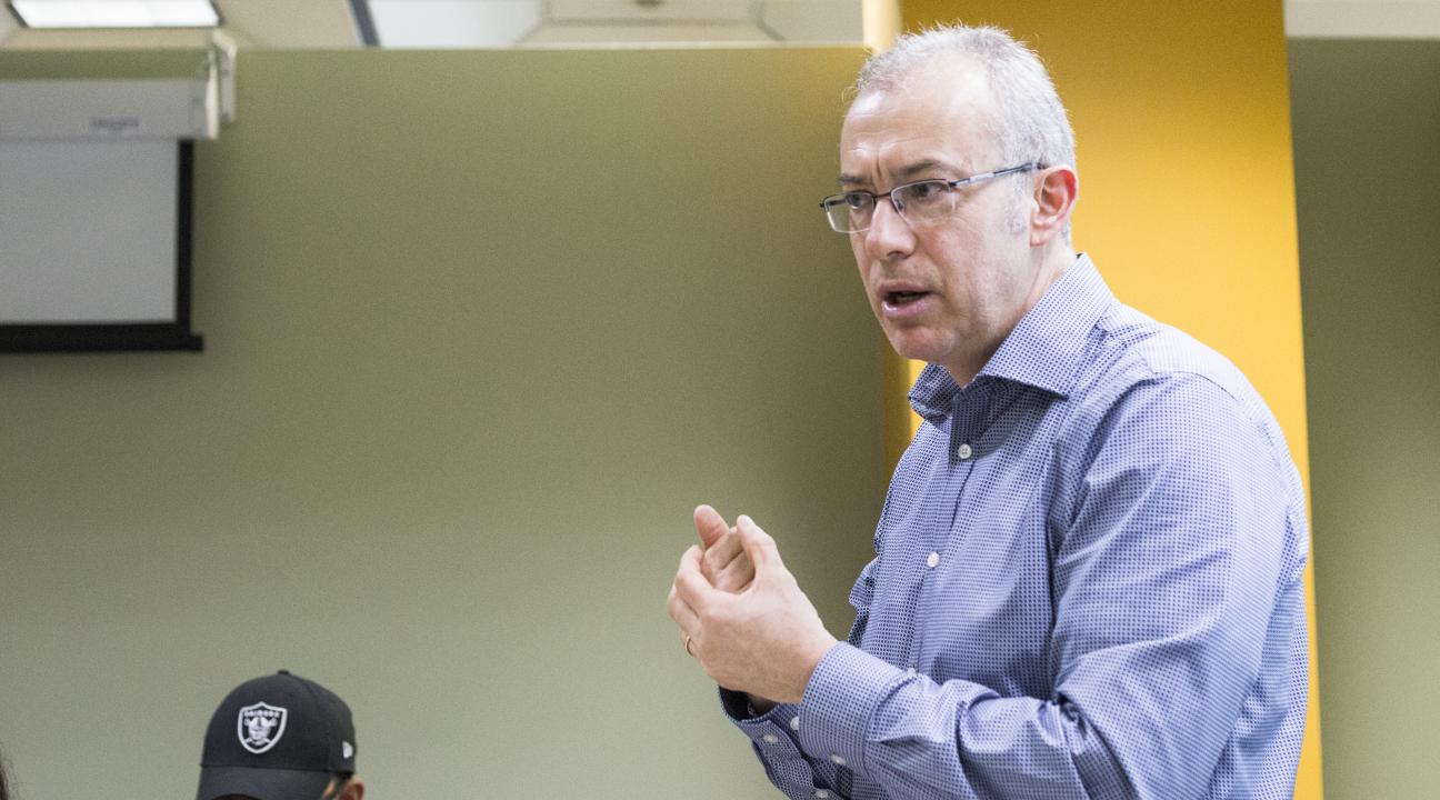 Dr. Daniel Malpica delivering content at a McNair workshop