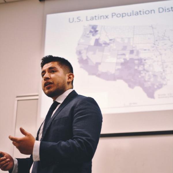 McNair Scholar, Raymundo Lopez giving a presentation